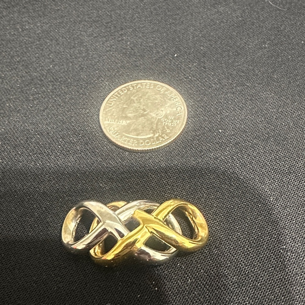 Two-Tone 10kGold & Silver Infinity Knot pendant -Omega chain not included.